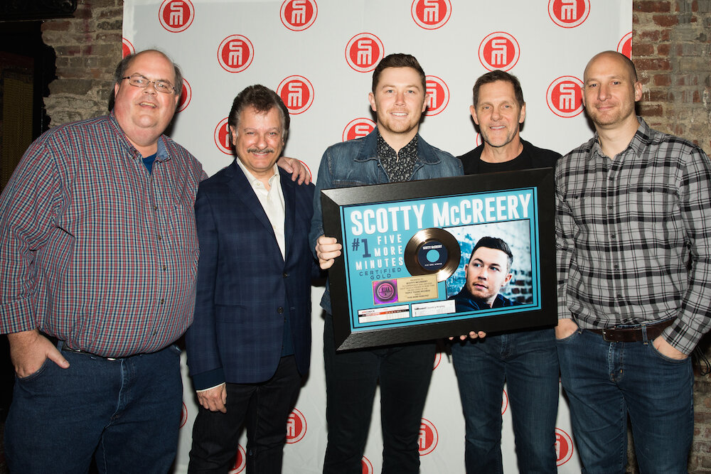 McCreery GOLD 1 plaque presentation